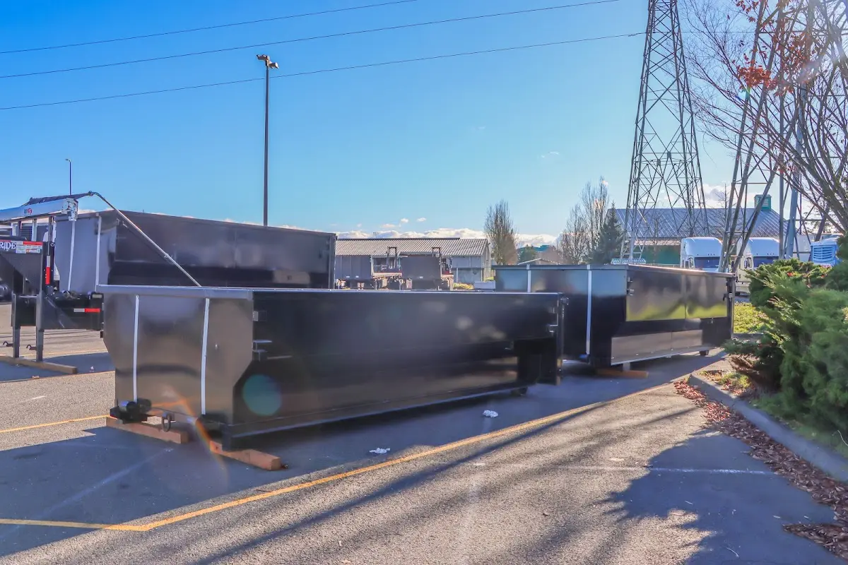 Roll-off dumpster ready for waste disposal at job site for 2 Yard Dumpster Rental in Windham